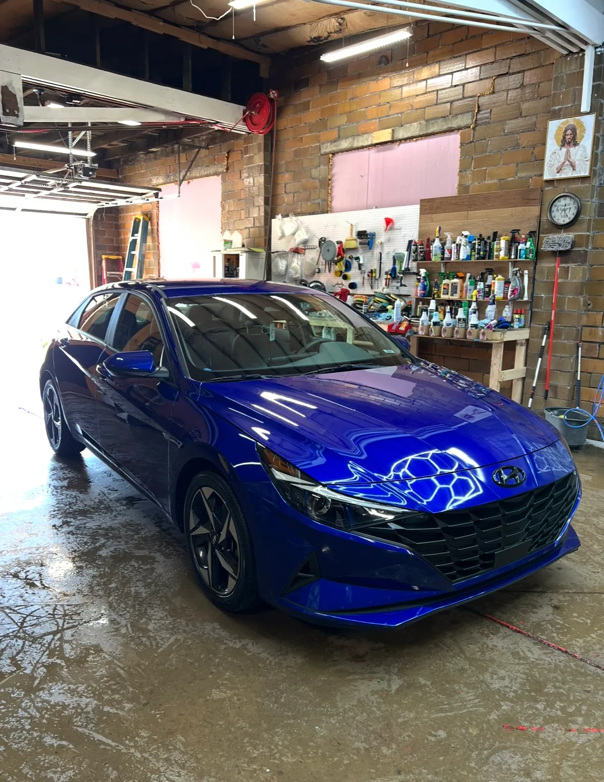 Blue Hyundai sedan after exterior detail