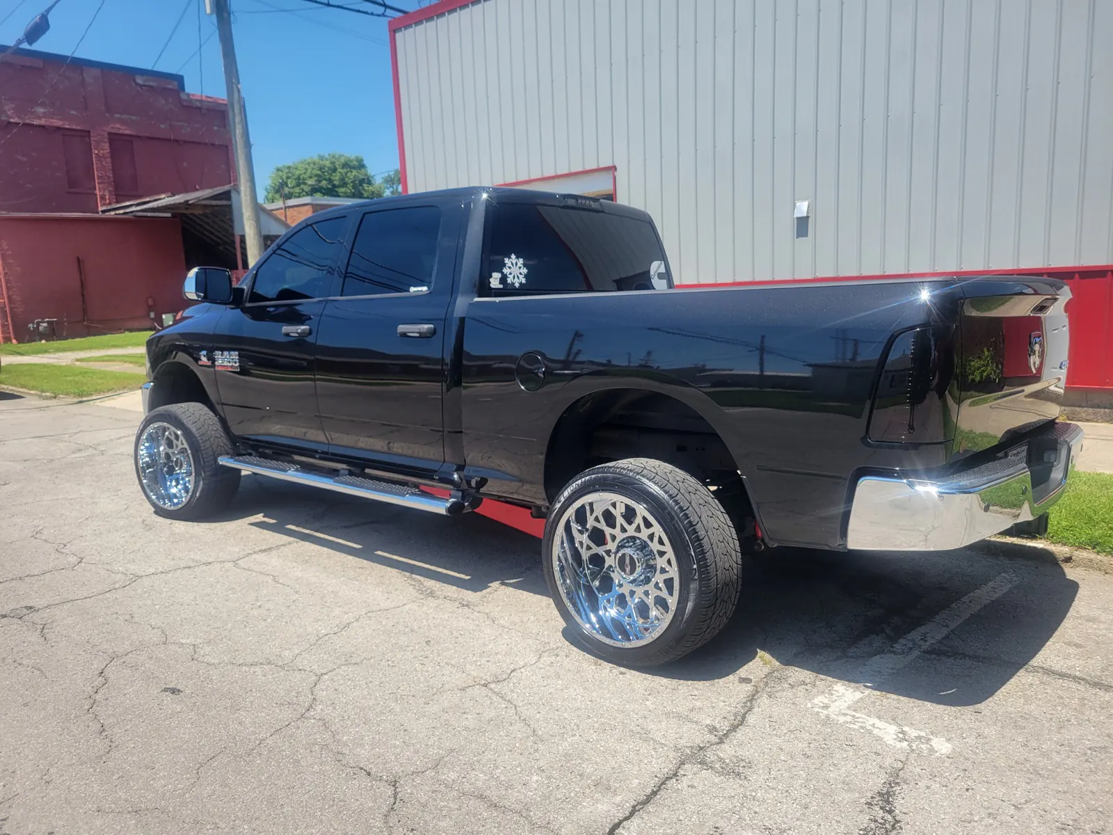 Black truck rear quarter after exterior detail